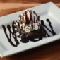 Dark Chocolate Brownie With Ice Cream made in Jugni restaurant, the best restaurant in Koramangala.